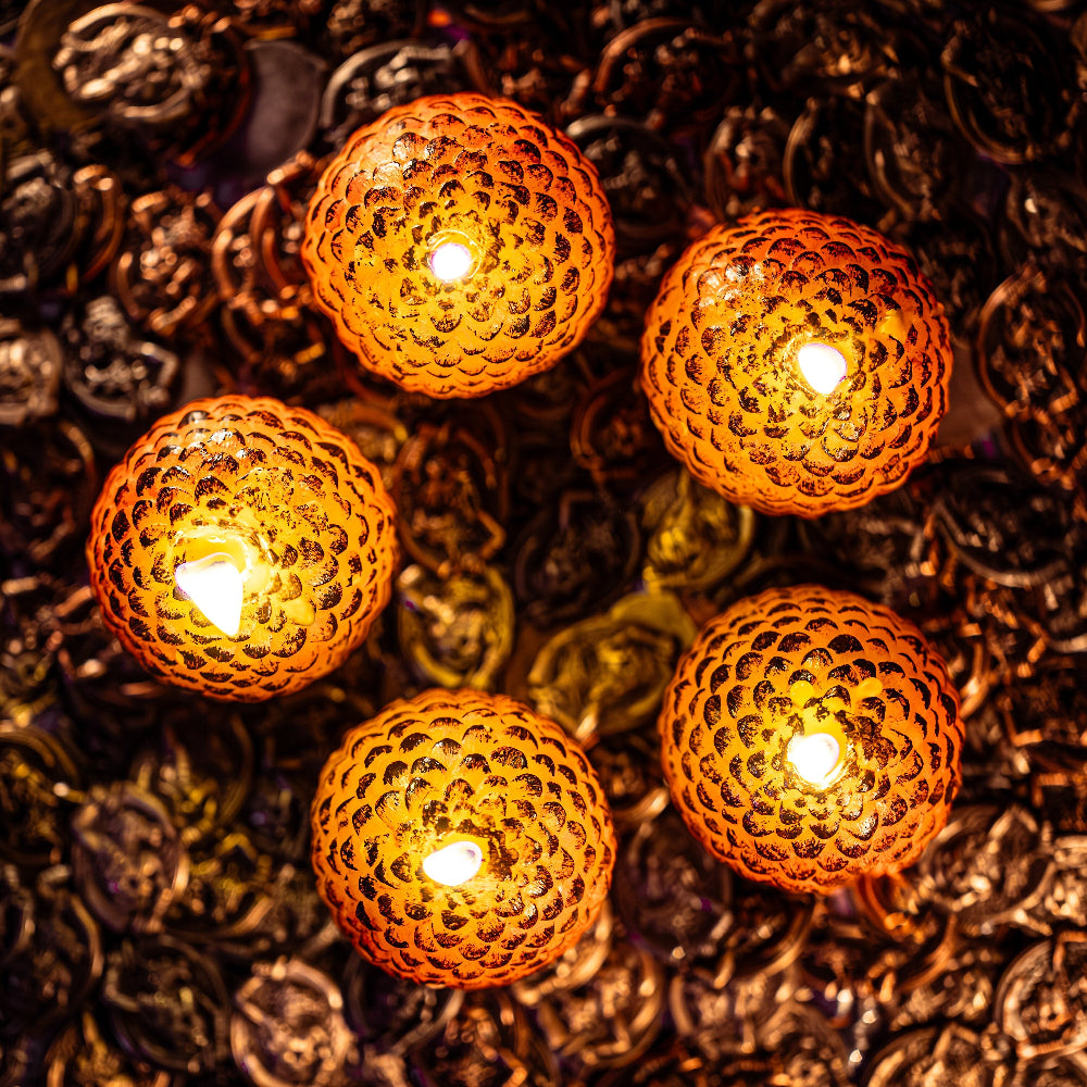 Five dragon egg candles viewed from above